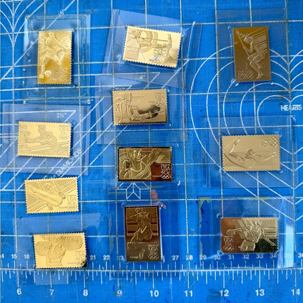 Gold Olympic Commemorative Stamps set of 11